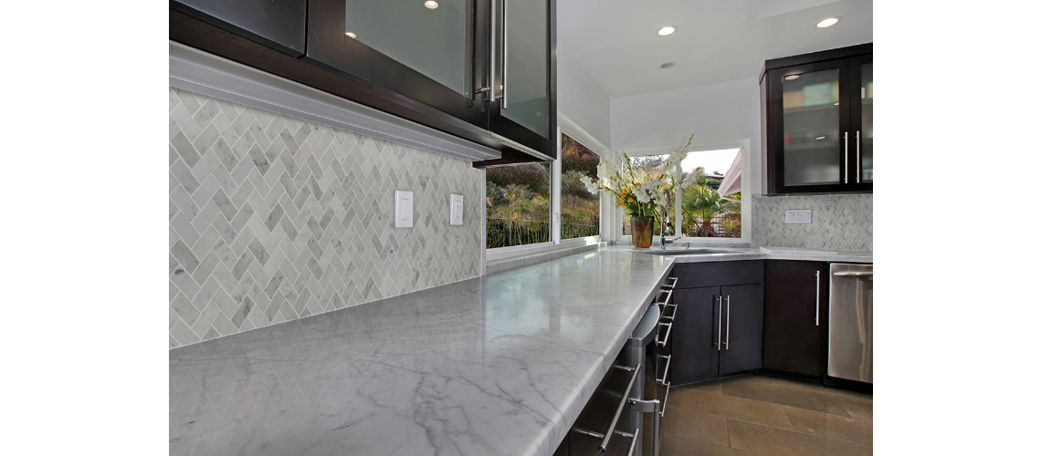 CARRARA WHITE 1X2 HERRINGBONE HONED